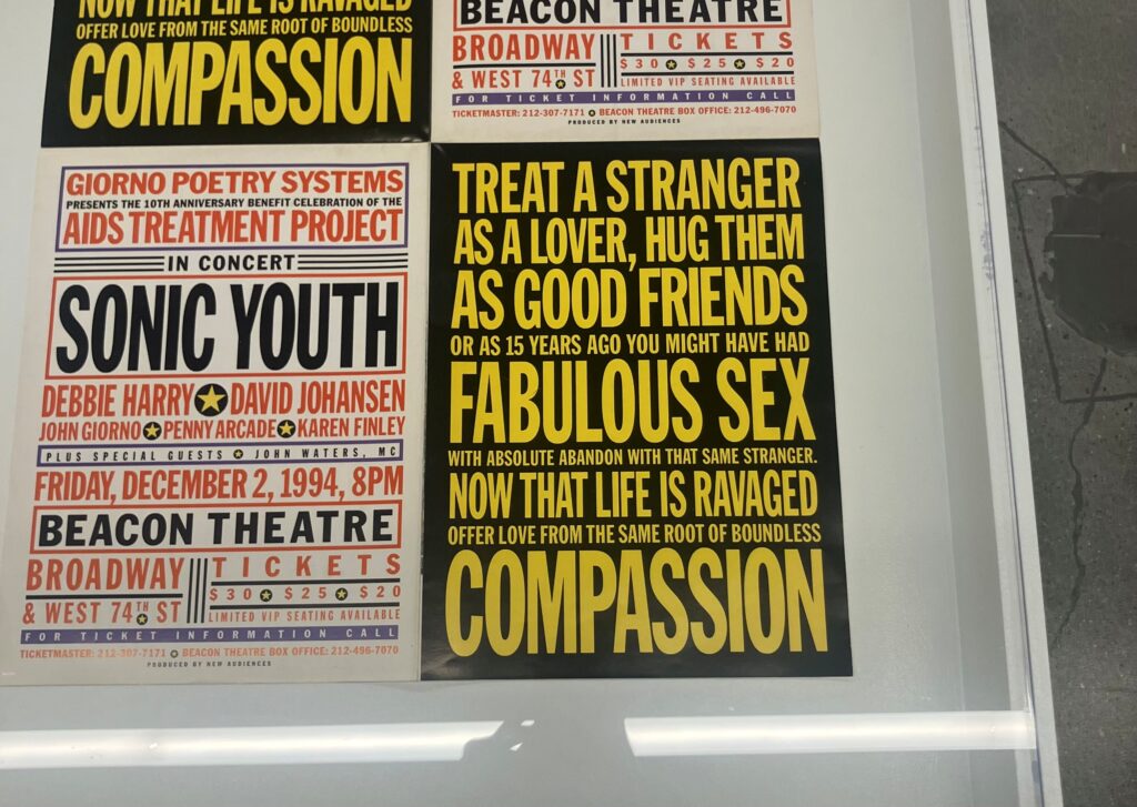A photograph of John Giorno's poetry posters.